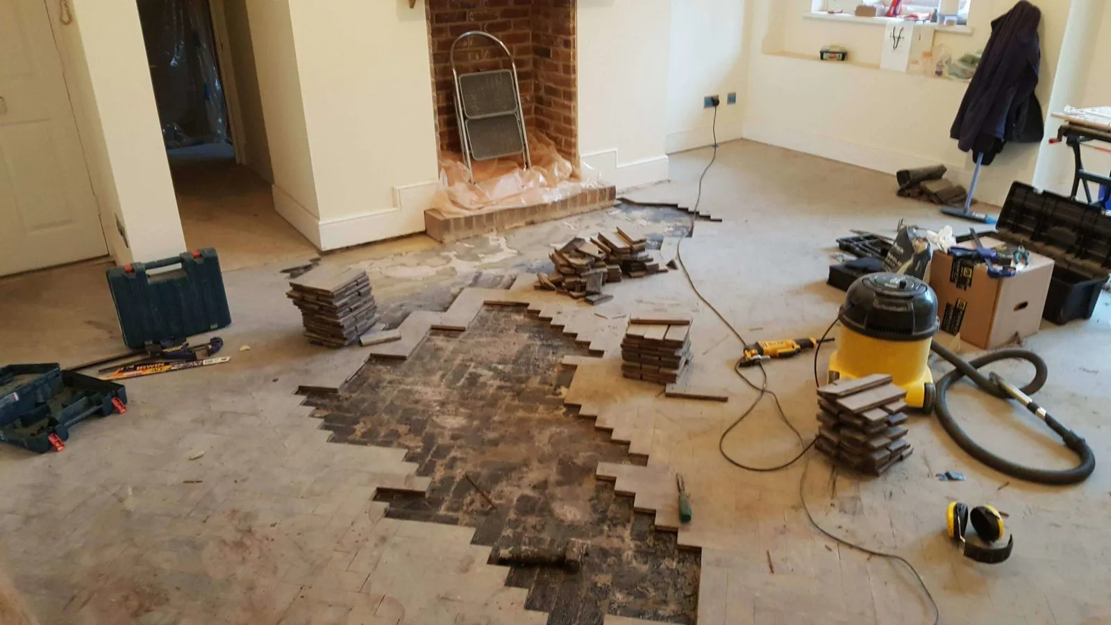 Floor 2. Walnut Herringbone Parquet- Before