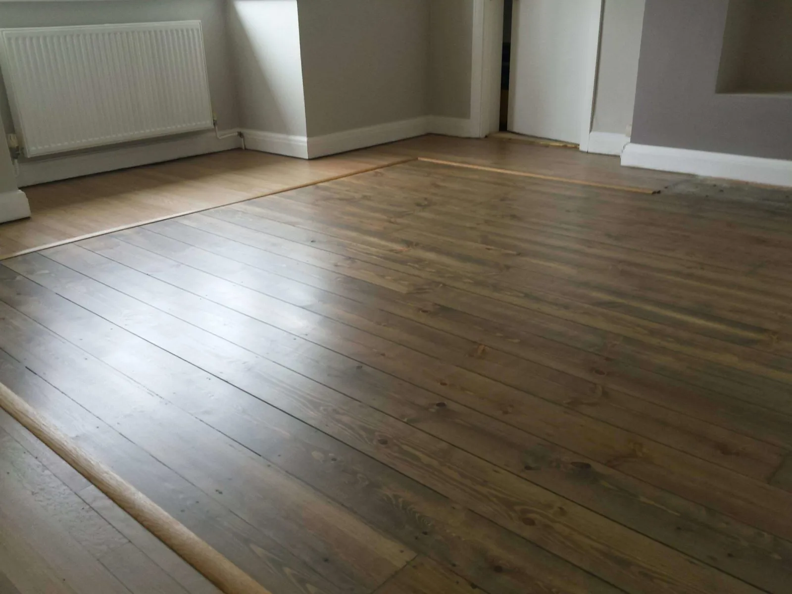 Floor 7. Pine Flloorboards with Solid Oak Planking Border - After